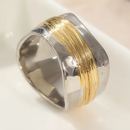 Anillos - Refinado Bicolor Plata y Oro